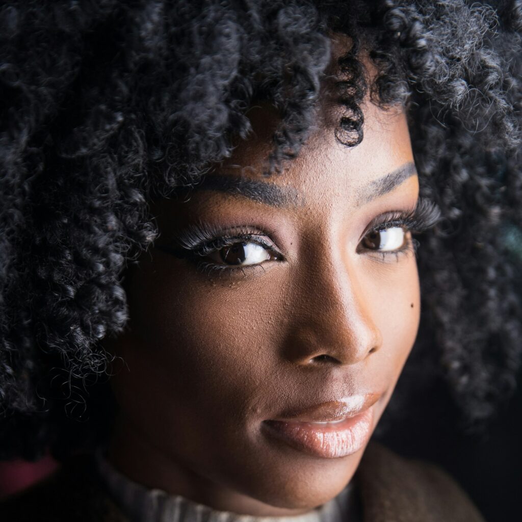 African American woman with black curly hair